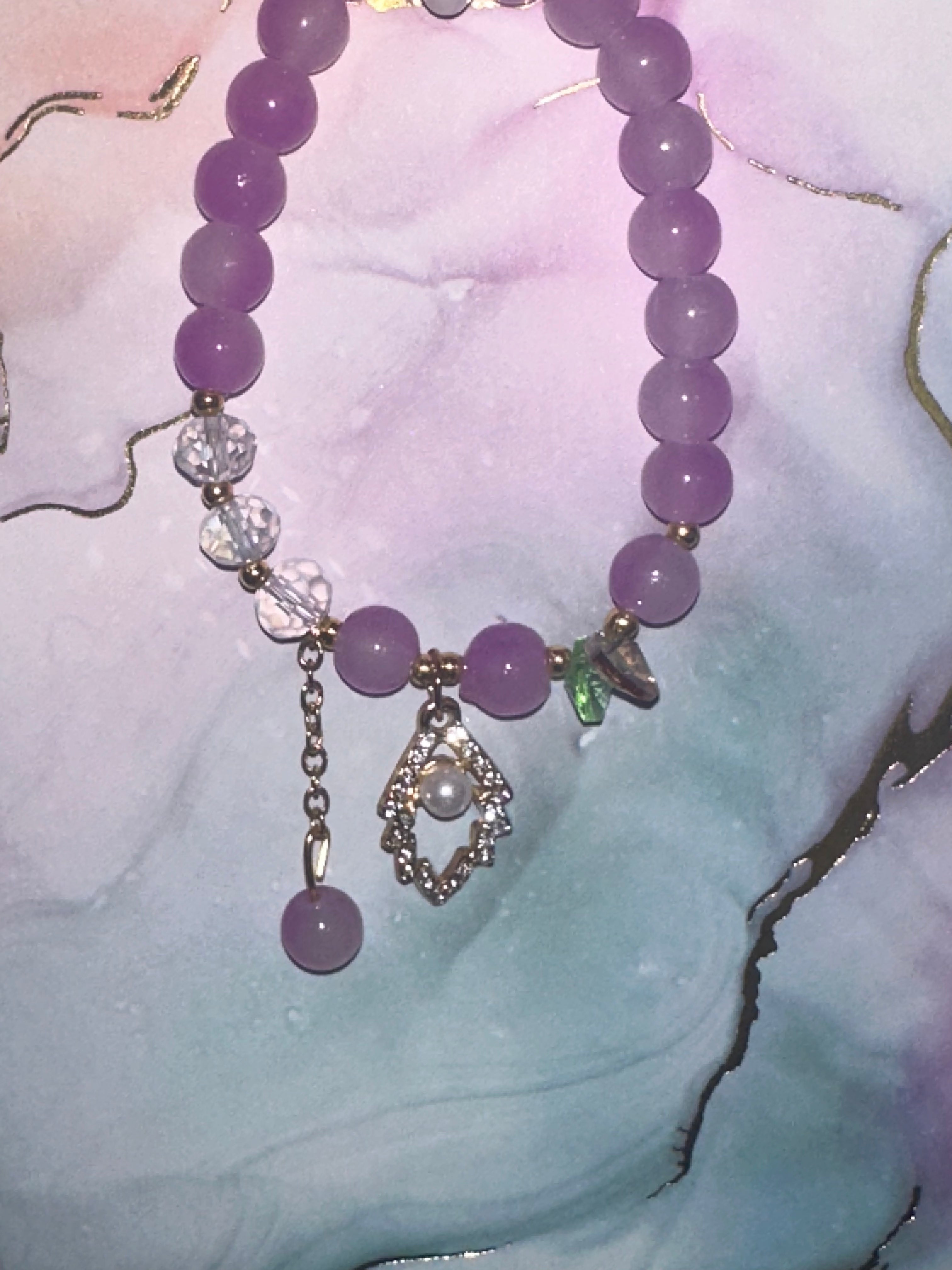 Purple and Bling Glass Bead Bracelet with Charms and Dangles