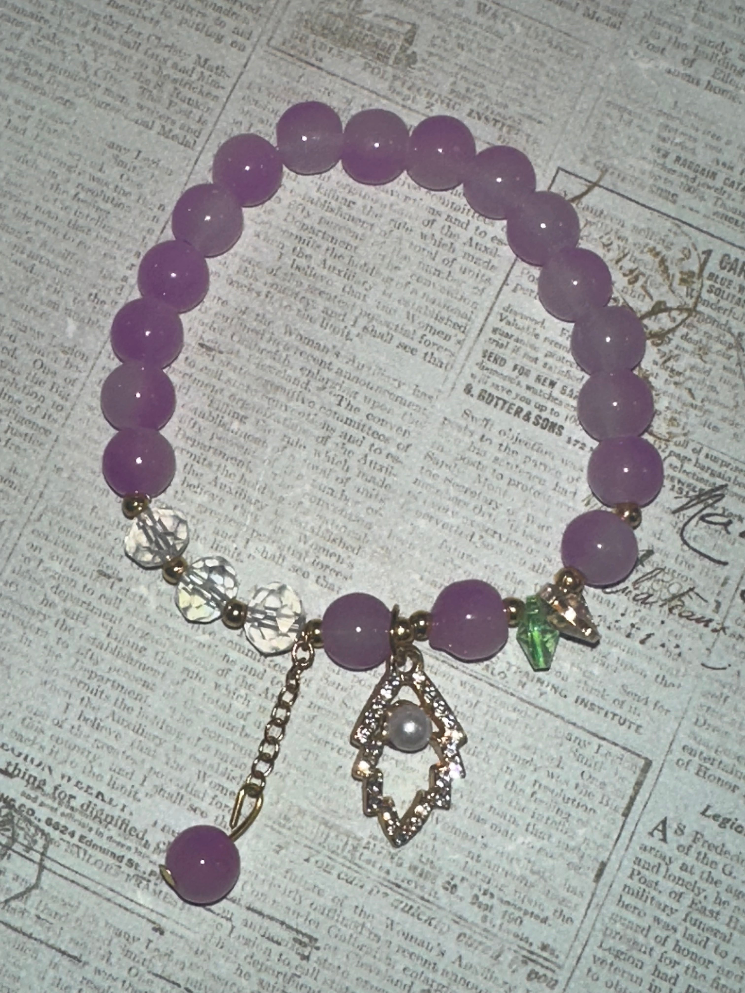 Purple and Bling Glass Bead Bracelet with Charms and Dangles