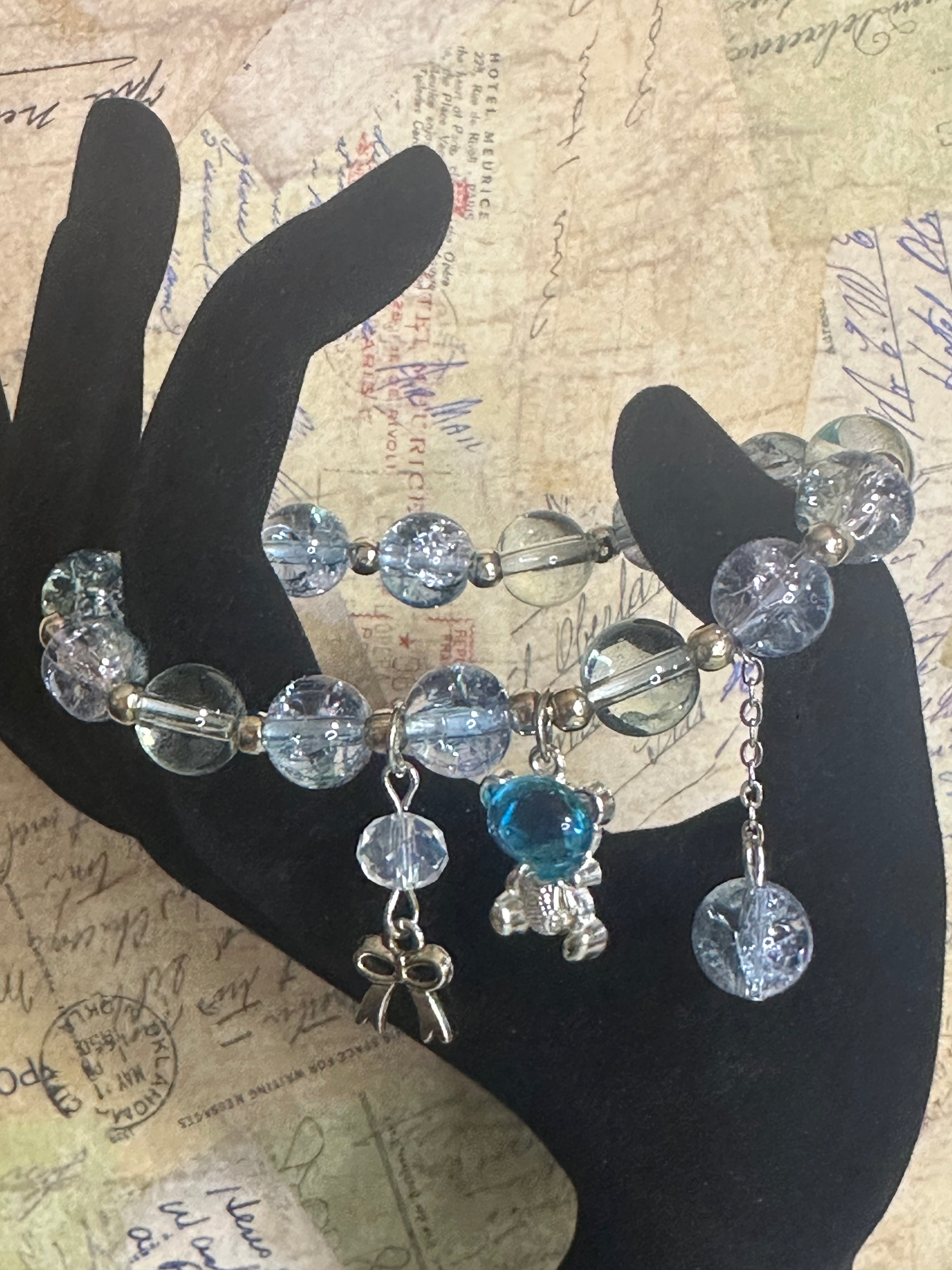 Blue Glass Bead Bracelet with Charms and Dangles