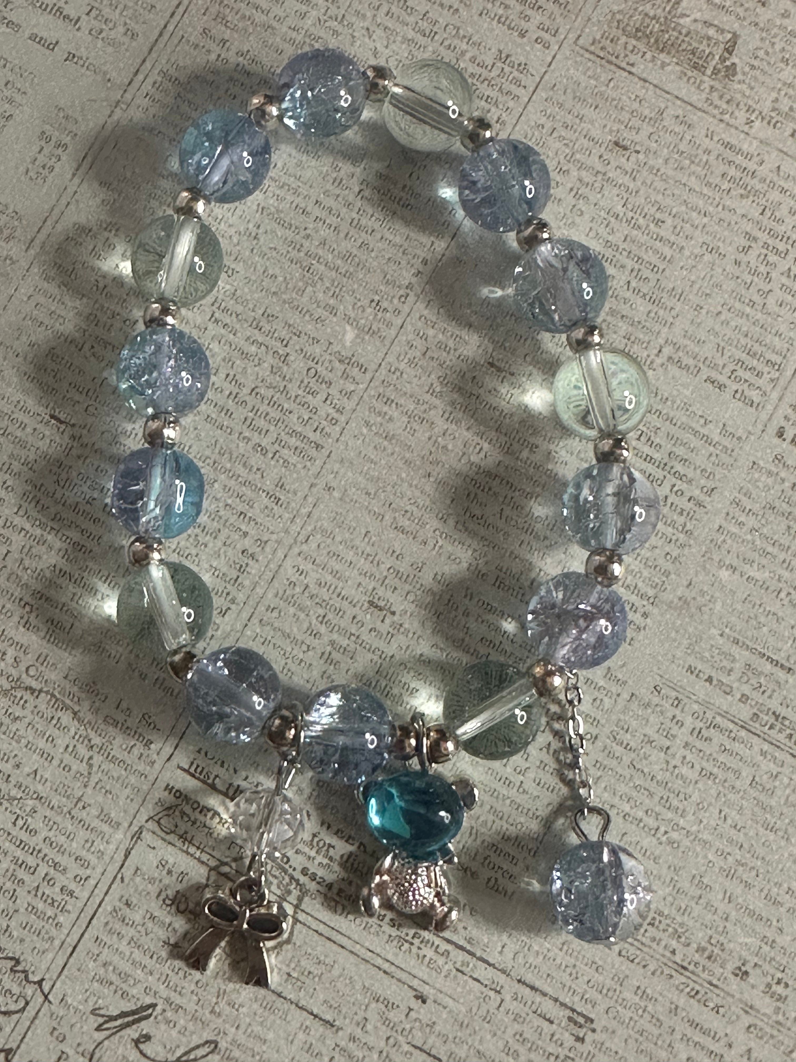 Blue Glass Bead Bracelet with Charms and Dangles