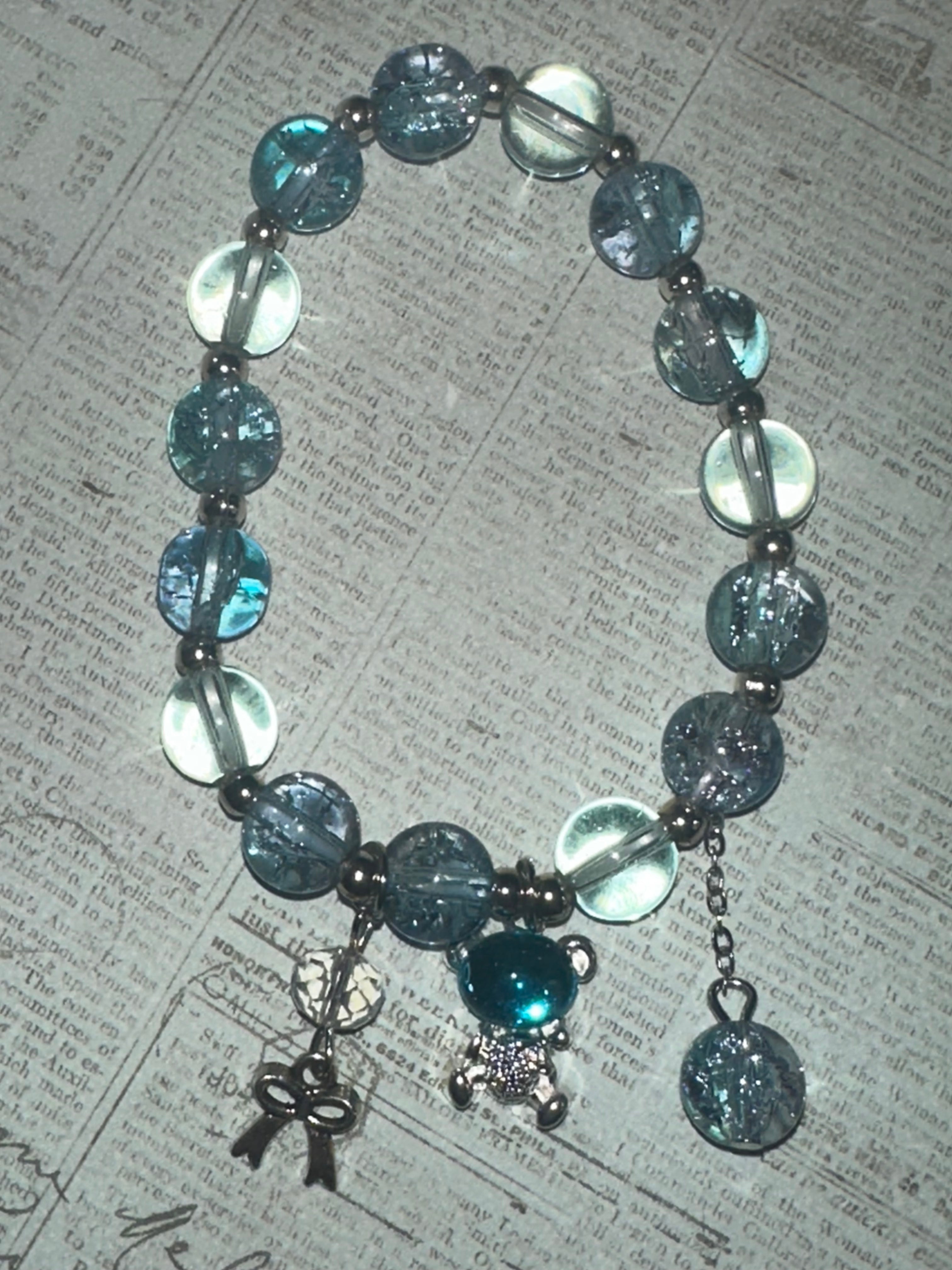 Blue Glass Bead Bracelet with Charms and Dangles